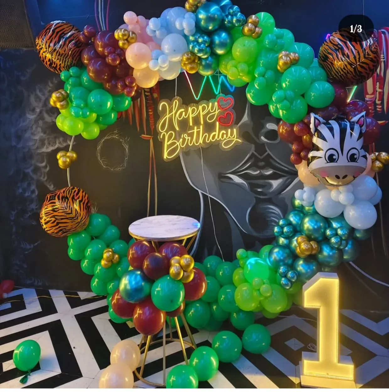 Gold and black birthday decoration with balloon pillars, Gurugram