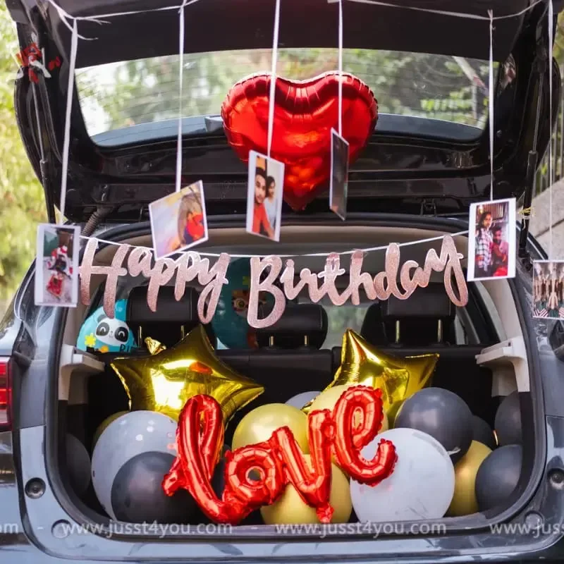 Car boot surprise setup with rose petals, Gurugram